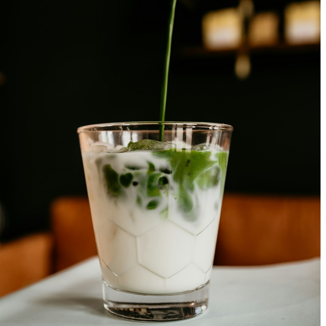 Matcha Green Tea Latte poured over ice and milk