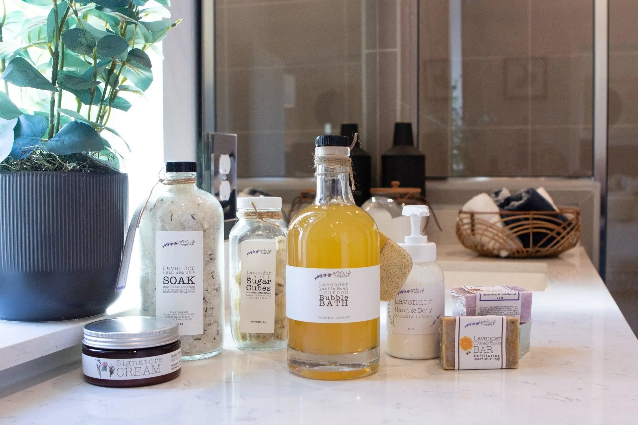 lavender products sitting on a bathroom shelf