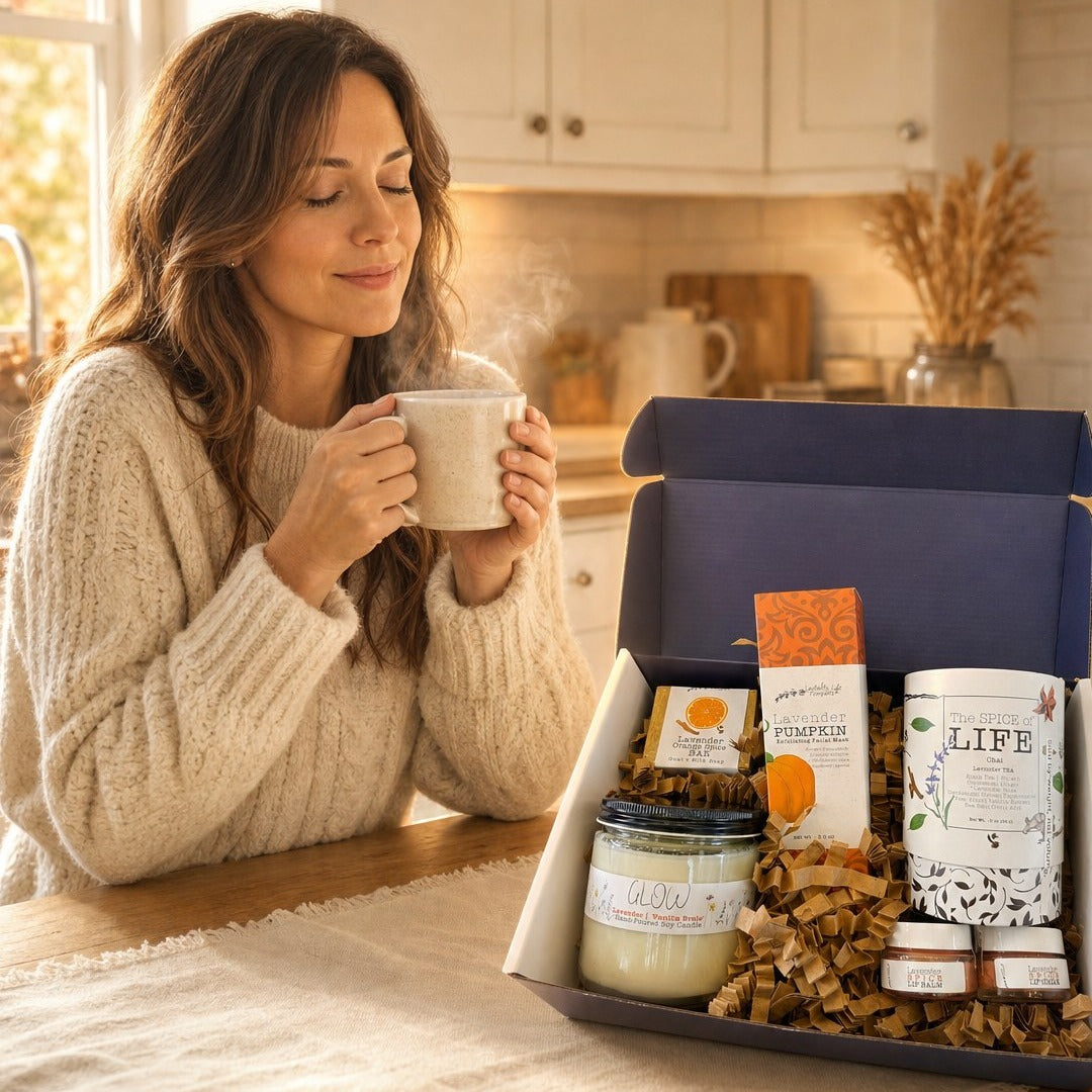 A woman with a warm mug beside the open Pumpkin Spice Bundle