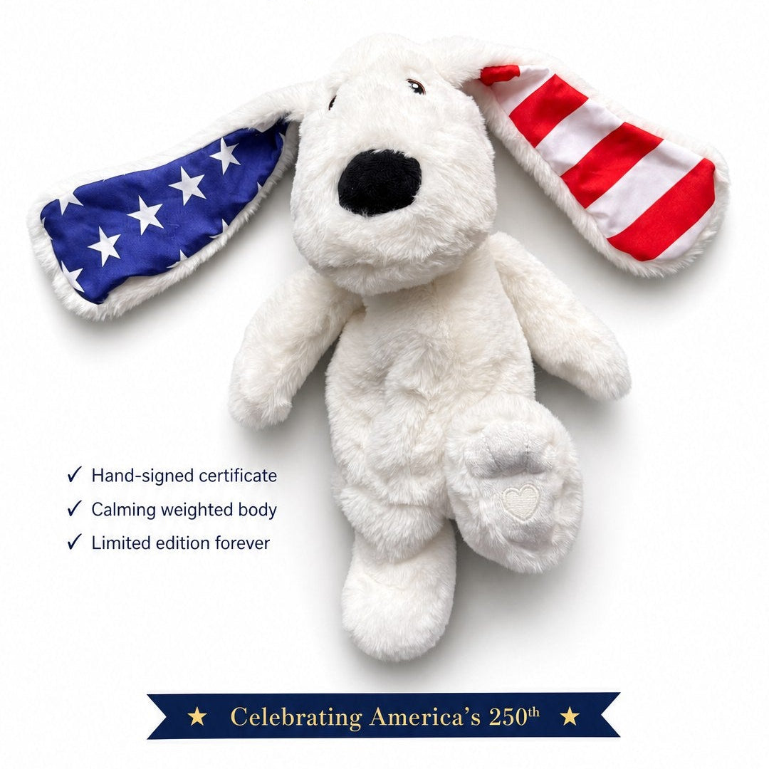 White plush dog with American flag ears and tail on a white background, featuring text about a limited edition product.